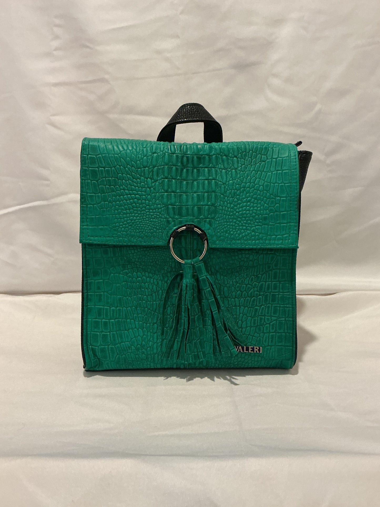 Green leather backpack